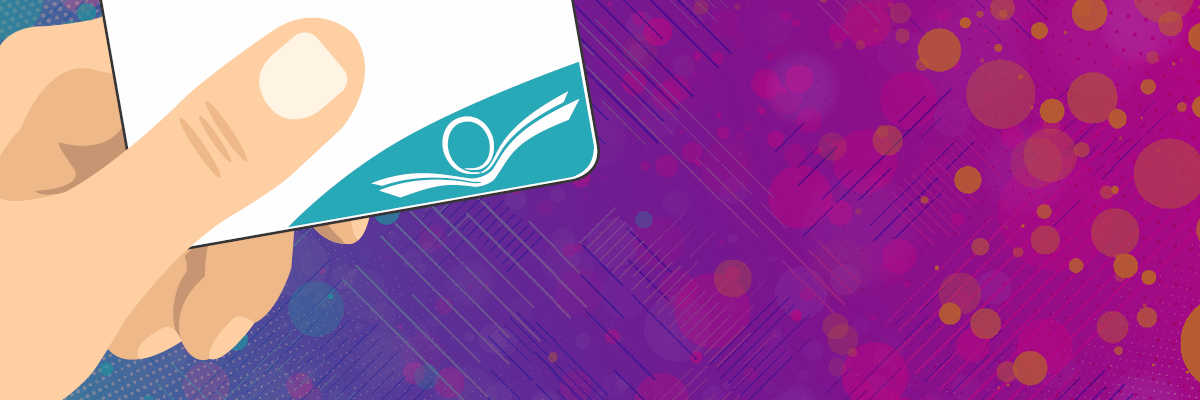 Hand holding a library card on a purple background